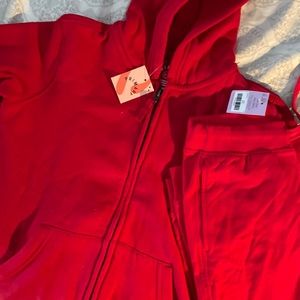 Primary size 8-9 red sweatshirt and matching pants